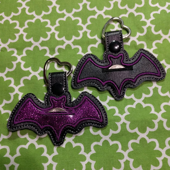 Purple Bat Aldi Quarter Holder Keychain