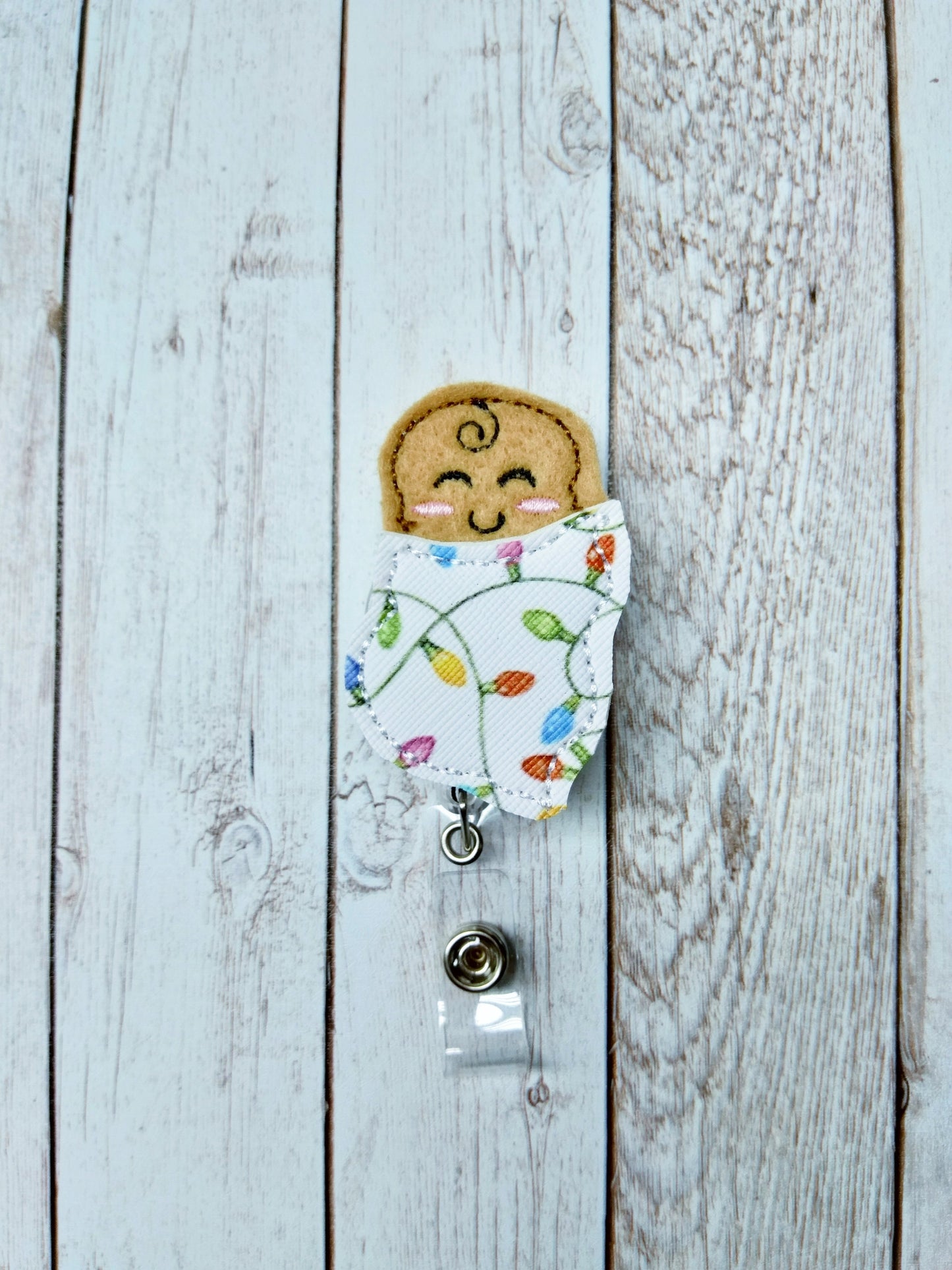 Christmas Baby Badge Reel
