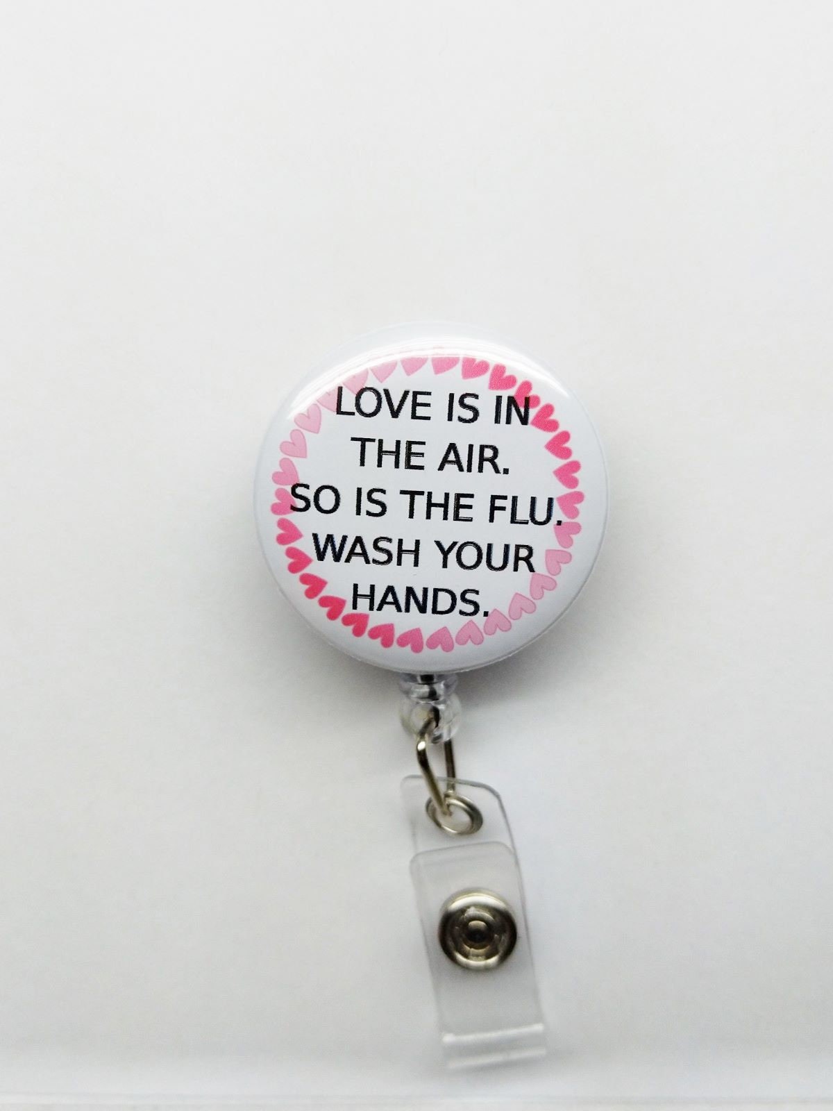 You Pick Flu Badge Reel