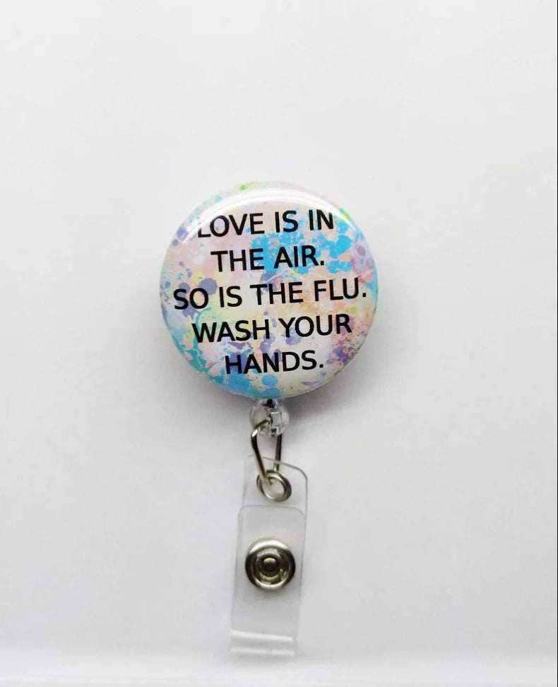 You Pick Flu Badge Reel