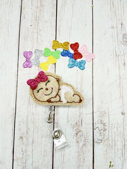 Sleeping Baby with Bow Badge Reel