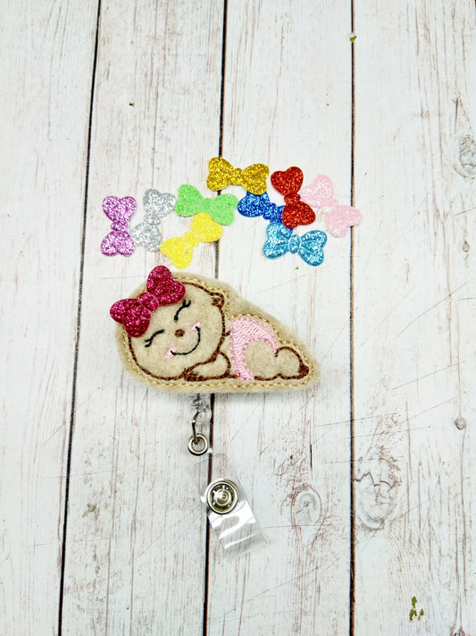 Sleeping Baby with Bow Badge Reel